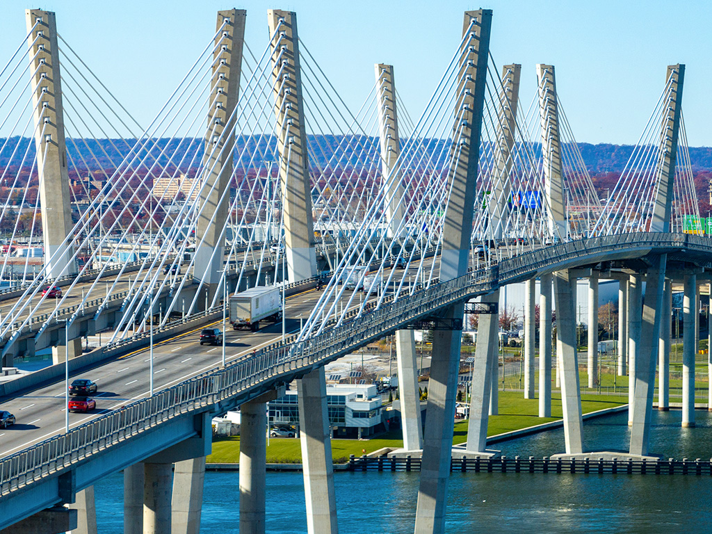Vehicles traveling across a bridge in Staten Island, New York City.